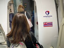 Boarding the Boeing 717 for the hour flight from Honolulu to Hilo.  Sitting on the left side, I'll have views of Diamond Head, and flying over Molokai and Maui.