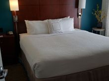 Suite bedroom with power outlets on both sides of bed 