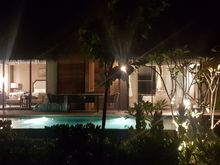 walking along the beach and looking into the beach villa