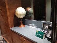 Counter with globe. Nespresso service