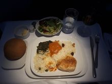 Fried Corn-fed Chicken with Tikka Sauce, Spinach Leaves, Basmati Rice with Nuts and Raisins