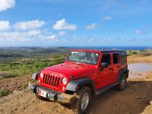 In Aruba, a red Jeep essentially conveys superpowers upon the driver. I promise. I had a midsize last time, and the experience with the Jeep was indescribably better.