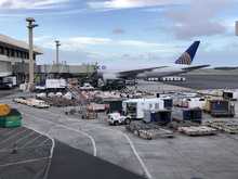 Almost to G gates and my first look at today's ride - N774UA from the connecting breezeway. 