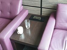 Used mugs and breadcrumbs on seats are there to welcome you (the staff eventually cleared the mugs but the crumbs were left in state)
