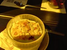 After meal, one of the FAs asked me whether I wanted fruit plate, cheese or ice cream. Toppings were mentioned, asked for almonds and was told no. A few minutes later another FA came through with the cart... Weird. And they had flaked almonds.