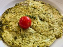 Maldivian omelette with chili and moringa leaves
