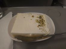 Dessert was served separately and it was a very tasty - revani with masticha cream and grated pistachio