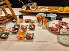 Salmon, feta, roast beef bites; cheeses behind. 