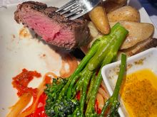This is the only time I have ever had a steak cooked perfectly on an airplane. 