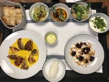 Our dinner - note the 4 smaller plates on the upper right hand side are the chef's taste for Inner Circke