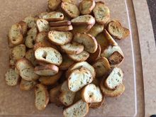 Home made garlic crostini. Will have later with Cracked Pepper Boursin cheese and fig ham. 