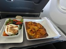 Pasta option. Standard, but probably spent a few too many minutes in the oven. The salad looked good. No bread etc. passed out as we were just below the 2,100 mile catering window. 