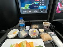 This was the fruit plate. Hot pancakes followed. You could also have had an omelette, but I have a rule of never eating egg dishes on flights :) This was our third breakfast of the day, at midday. But the food was good so I won’t complain more than that.