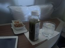 Juice and nuts offered. There was also a hot towel. 