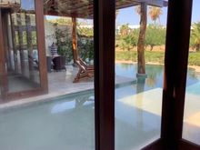 view fro master bedroom looking toward shade terrace