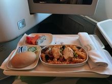 Meal before landing: Pasta with chicken or pork patties with soya sauce was another option. I chose pasta which was inedible: dry, chewy and it had disgusting taste. Unacceptable for business class. But fruits were good.