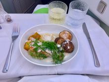Main course of salmon with potatoes. Salmon tasted ok, potatoes not so much. Presentation was above the Finnair average, maybe the dill garnish made the trick.