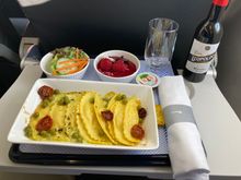 Ricotta mezzaluna with pea panna (VLML pre-ordered, but the same as the vegetarian option for all passengers). There was also a pumpkin salad offered in the cabin. 