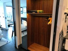 Closet between bedroom and bathroom