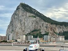 The jet arrives, as seen from the balcony outside the Calpe Lounge.