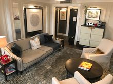Living room seen from the antechamber walk through closet