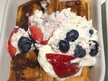 Buttermilk waffles - housemade nutella, peppercorn creme fraiche, berries