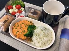 enroute to hawaii , a hot dinner service after take off