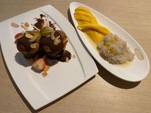 Chocolate profiteroles with chocolate ice cream and mango sticky rice