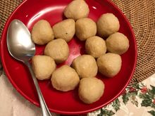 Fish balls , the slightly larger ones have bits of chilli and onions