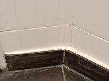 dirty tiles on the floor and wall