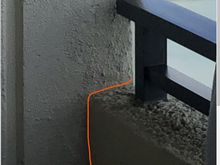 Gap between building and deck wall
