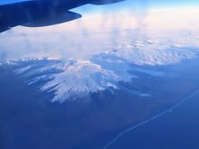 Coast of Iceland with a huge volcano nearby 