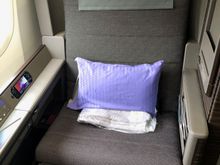 Let's start with the seat itself. I think it would be wide enough for just about anyone to fit, and I could only comfortably put one arm on an armrest at a time. The seat was fairly hard and the fabric wasn't particularly soft, but that was fine by me since I was wearing comfortable clothes.