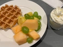 Made to order waffles with whipped cream and fruits