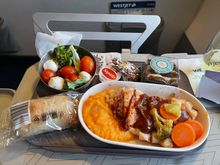 Westjet 2207 Cancun to Edmonton 26 February 2022. Premium Cabin. BBQ Chicken