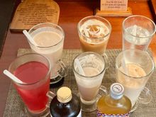This morning ‘ s beverages include various iced lattes , The Cure which has soursop , ..