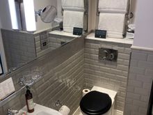 Sufficiant shaped bathroom 