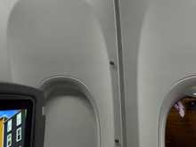 Attachments for crew rest curtain around seat 4F