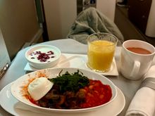 BA2231 LGW-BKK 2nd meal breakfast: comically rubberised “poached” egg, mushrooms, beans, spinach. Served with plain soy yoghurt that tasted frankly disgusting.