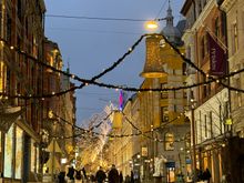 illuminated street in the downtown area