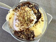 Traditional Ice Cream Sundae with hot fudge, whipped cream, chopped pecans. I don't think I could ever bring myself to choose a different dessert. This one was rock hard and not as good as the Haagen Dazs ice cream served outbound from the states, but no regrets.