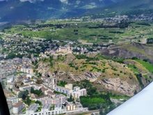 A clear view of the city of Sion before landing back at the airport there 