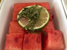 "Fresh Fruit - watermelon, lime, mint" - for prepped airline fruit, this was light, refreshing and still juicy, which is all one can reasonably expect.  To JetBlue:   the mint would taste/feel less old if it was cut in smaller pieces than the rough chiffonade shown here.