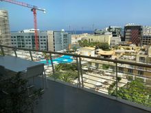 Very large furnitured balcony looking to North West