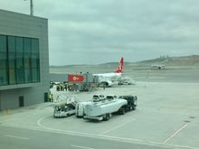 An actual B737 on which we will fly! Note all the construction vehicles in background 