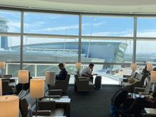 After the club's reception, you'll see the big room with nice windows letting in light and chairs in rows or next to the window, there is a seperate style seating area close to the bar on the left ...... 