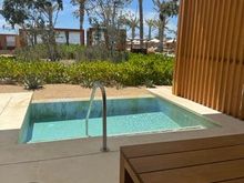 view, behind cabanas of family pool area
