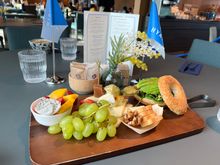 “Family” breakfast platter in the roped off Globalist area (note the World of Hyatt flags on the table) 
