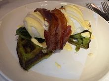 Poached eggs with savoury spring onion waffles