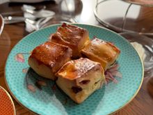 Scones with clotted cream and seasonal jams.